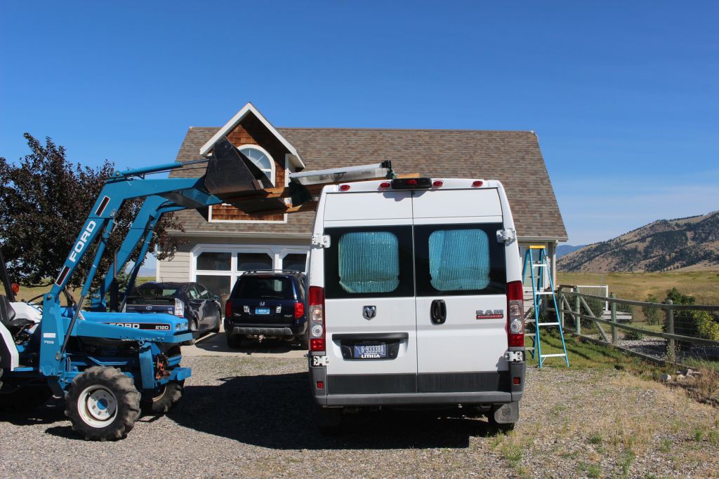 Placing PV panel on roof.