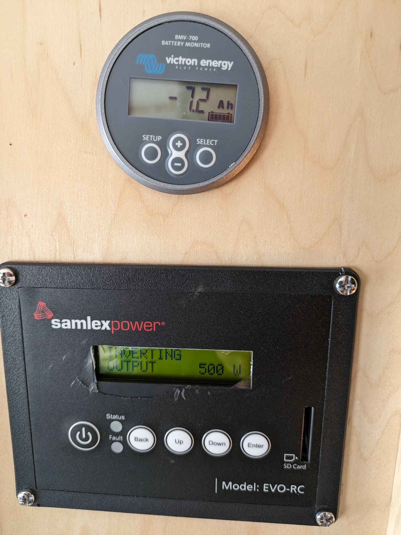 The battery monitor and inverter control panel.
